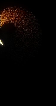 Golden star trail flying around with twinkling particles floating in the air. Gold dust particles glowing moving on black background overlay.