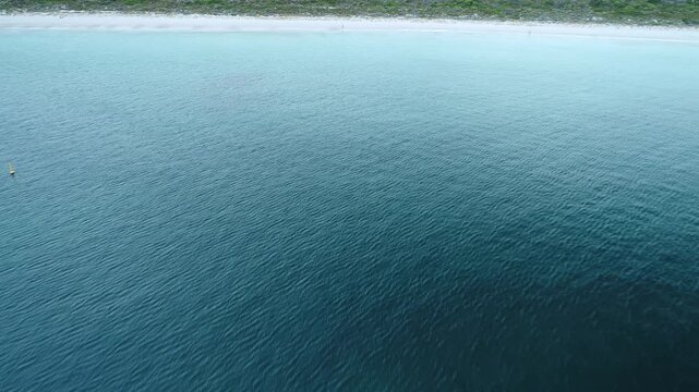Flying low over whit fords beach towards shoreline
