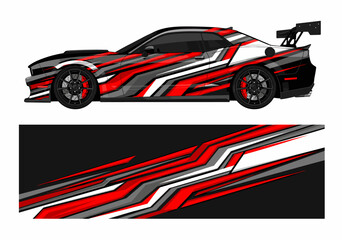 Obraz premium Black sedan with red and white angular racing stripes.