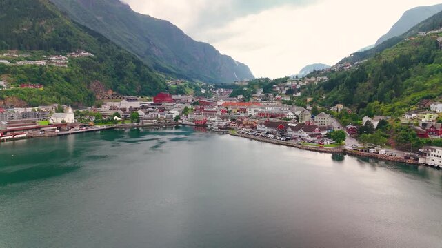 Aerial Drone View of Odda Town Surrounded by Mountains and Fjords, Norway