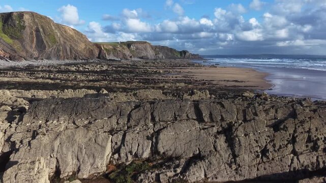 Drone flying over rocks revealing wonderful coastal landscape on the Cornish coast