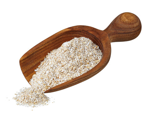 bran in wooden scoop isolated on white