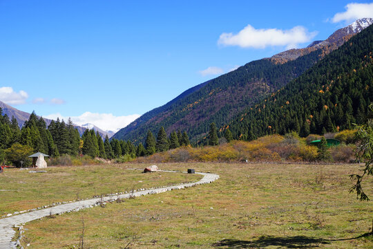 Nature of Dagu Glacier National Park, Sichuan China the "youngest," lowest-altitude, and closest glacier to major city in the world with stunning views of snow-capped mountains and turquoise lake