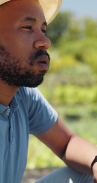Tired, sweat and agriculture with black man on farm for harvest, crop fatigue and heatstroke. Farmer, burnout and sunstroke with exhausted person in countryside for heat wave, growth and overworked