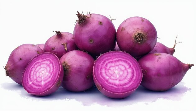Pile of purple yams or sweet potatoes, one cut revealing concentric rings. Vibrant root vegetables isolated on white. Healthy, organic food for cooking or diets.