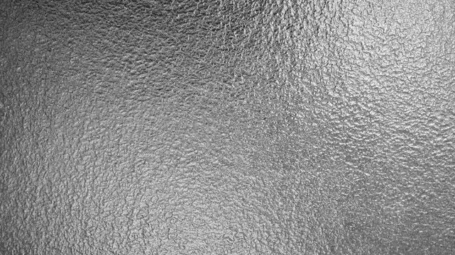 grainy silver metal textured rough gray aluminum foil surface 4k plain monochrome background video
