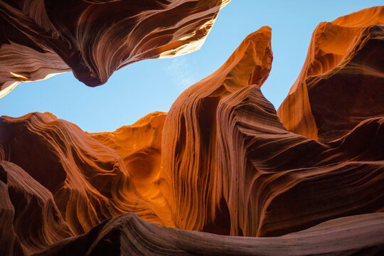 Looking up at blue sky from Antelope Canyon