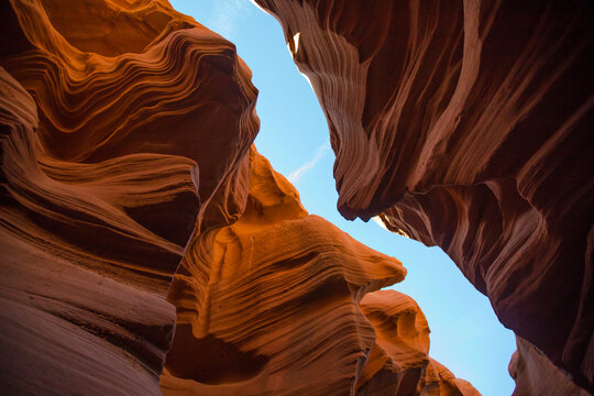 Low angle view inside a red rock slot canyon