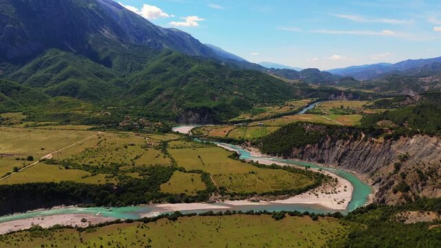 drone reveals Vjosa river flowing through the Kelcyra Gorge canyon and rural valleys in southern Albania travel destination in Balkans Europe 