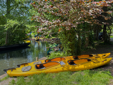 Spreewald canal landscape with yellow kayaks 