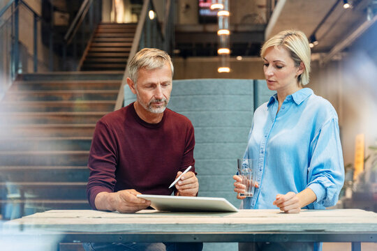 Business professionals planning and discussing work at modern office