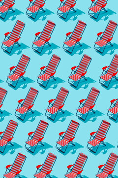 Diagonal grid pattern of striped beach chairs on blue background