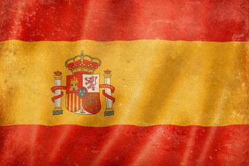 Fototapeta premium Old vintage flag of Spain, worn and stained