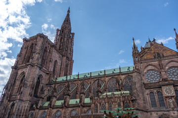 Fototapeta premium South side of Strasbourg Cathedral under blue sky