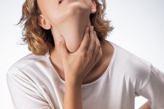 Sore Throat Close Up Woman Holding Neck Pain On White Background Studio