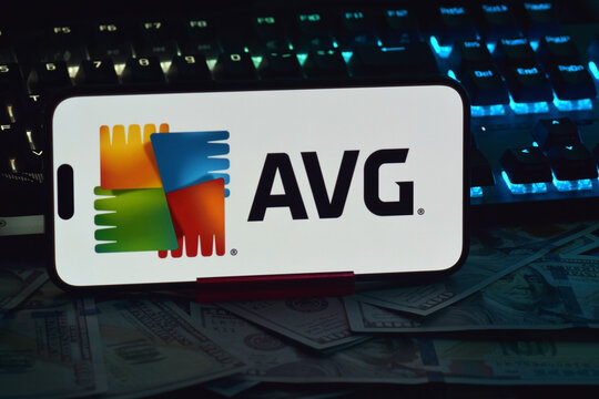 On a mobile phone screen logo AVG Corp global computer security software company.