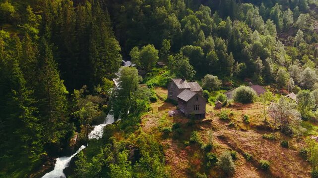 Aerial Drone Footage of Rein&aring;na Waterfall near Buarbreen, Norway