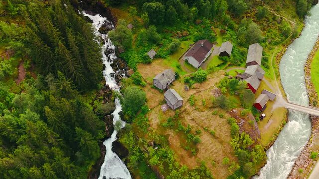 Aerial Drone Footage of Rein&aring;na Waterfall near Buarbreen, Norway