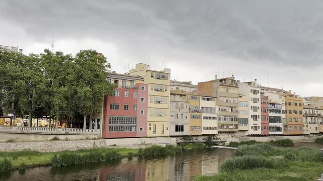 Beautiful view of the famous colorful houses along the Onyar River in Girona, Catalonia, Spain
