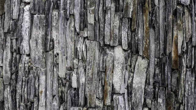 Slow Pan Across Textured Grey Stone Wall Background