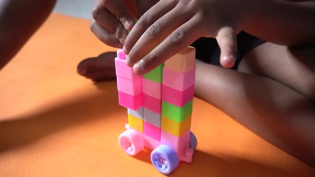 Colorful interlocking plastic building blocks for educational play, creativity development, problem-solving skills, and imaginative learning activities.