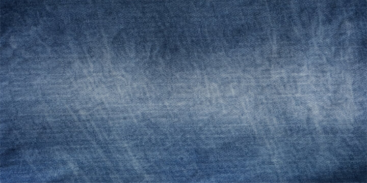 A textured, blue denim fabric with visible threads and a slightly worn appearance, suggesting a classic and rugged material.