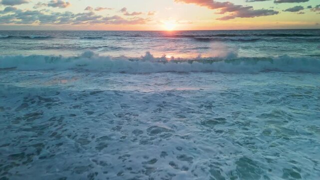 Aerial View of Ocean Waves Crashing on Fraser Island Rocky Shore at Sunset
