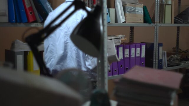 Office storage shelves with organized binders