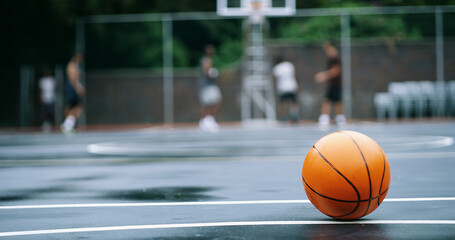 Obraz premium Basketball ball, sports and court for outdoor competition, fitness and play on college campus. Hobby, asphalt and game playground space for match, morning and practice ground at athletic club