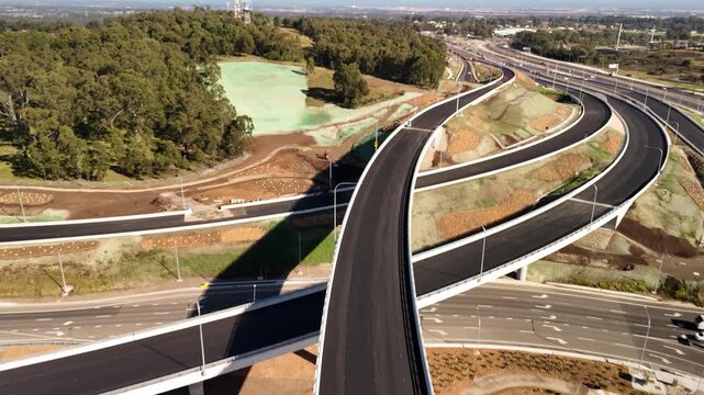 Aerial drone view above the M7 -M12 Interchange at Cecil Hills, Western Sydney, NSW Australia on a sunny morning in June 2026
