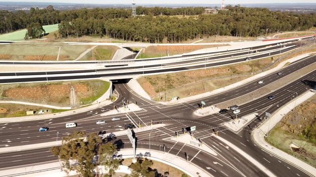 Aerial drone view above the M7 -M12 Interchange at Cecil Hills, Western Sydney, NSW Australia on a sunny morning in June 2026