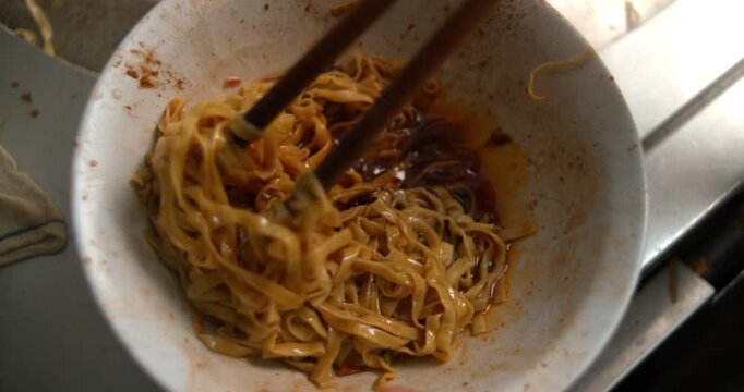 Mee Pok Noodles Mixed With Black Vinegar in Singapore Hawker Stall