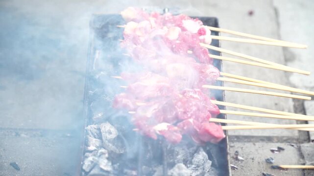 Top View of Raw Mutton Satay Grilling on Charcoal - Landscape