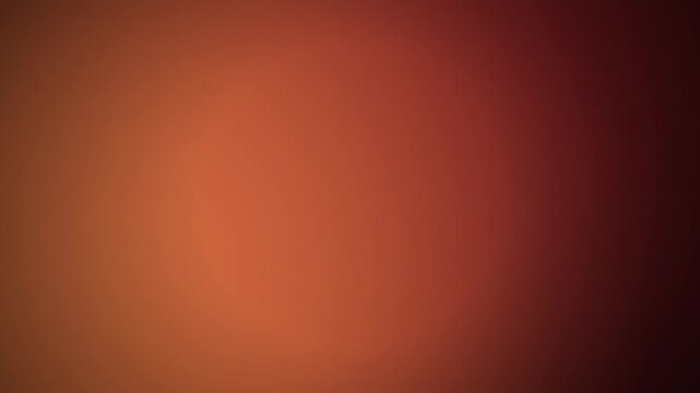 Abstract warm terracotta red and dark brown blurred radial gradient background template in horizontal orientation