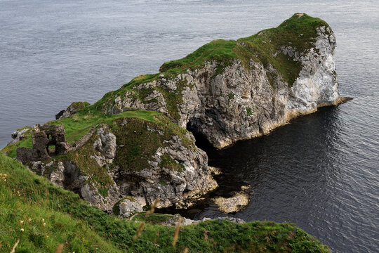 Landscape photo overlooking the ruins of Kinbane Castle on the rocky coast on the north coast of Northern Ireland