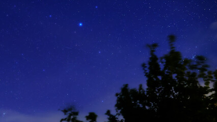 Obraz premium Planet conjunction, Milky Way stars and landscape scenery silhouettes.