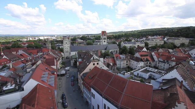 Static wide angle aerial view of Ravensburg old town looking towards Weingarten with Frauentor tower and Liebfrauenkirche church, Germany