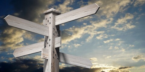 Wooden signpost with four arrows and sky in background - 3D illustration © PX Media