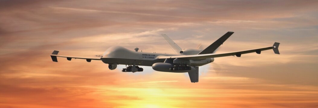 Drone Reaper en vol ciel fin de journ&eacute;e banni&egrave;re