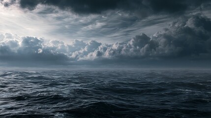 Fototapeta premium A dramatic seascape with dark stormy clouds gathering over the ocean water