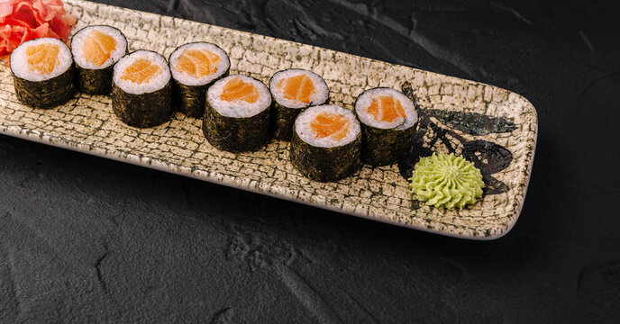 Salmon Maki Sushi Rolls on Stone Plate