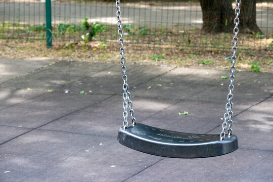 Empty Swing At Playground