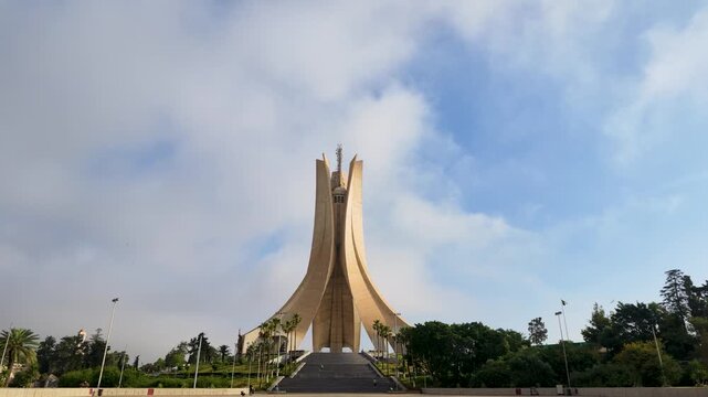 The Martyr's Memorial monument in Algiers under a cloudy sky
