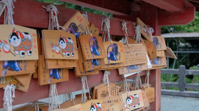 wooden prayer plaques hanging at a shrine in japan for wishes and blessings at Dazaifu,Fukuoka,Kyushu,Japan 