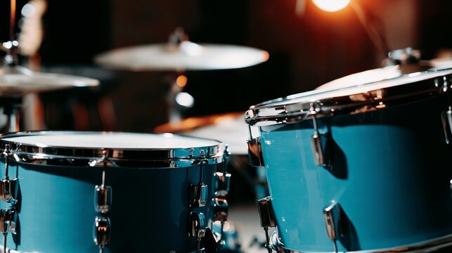 Turquoise drum kit with chrome details, capturing the essence of rhythm and musical performance in a moody studio setting