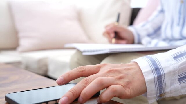 Professional writing notes for goal setting and personal development. Planning process, progress tracking, work organization, productivity improvement and achievement concept.
