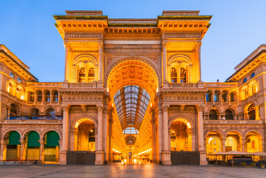 Milan, Italy. Illuminated entrance arcades in Duomo Square