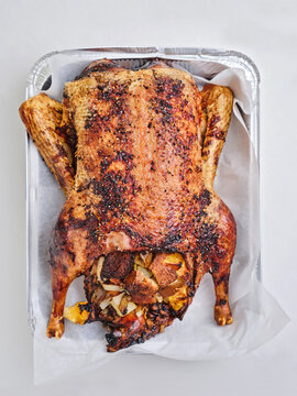 Whole roasted turkey with stuffing, holiday feast concept for gatherings and celebrations