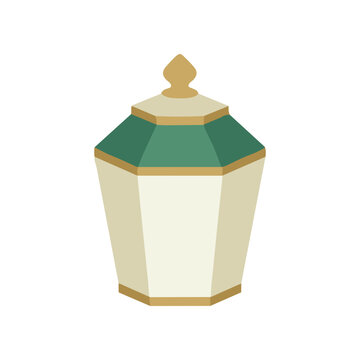 Green and beige decorative storage jar.
