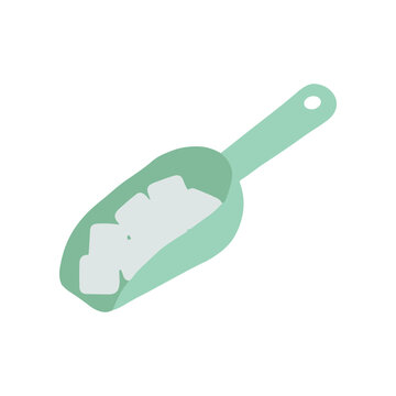 Green plastic scoop with white cubes.